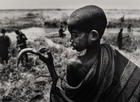 Sebastião Salgado (born 1944) Fishing in the marshes of the Gel Canal, which is filled with waters from the Nile River, Southern Sudan, from the series "Genesis," 2006