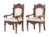 A Pair of French Renaissance Revival Carved Walnut Armchairs