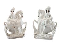 A Pair of Staffordshire Equestrian Figures
