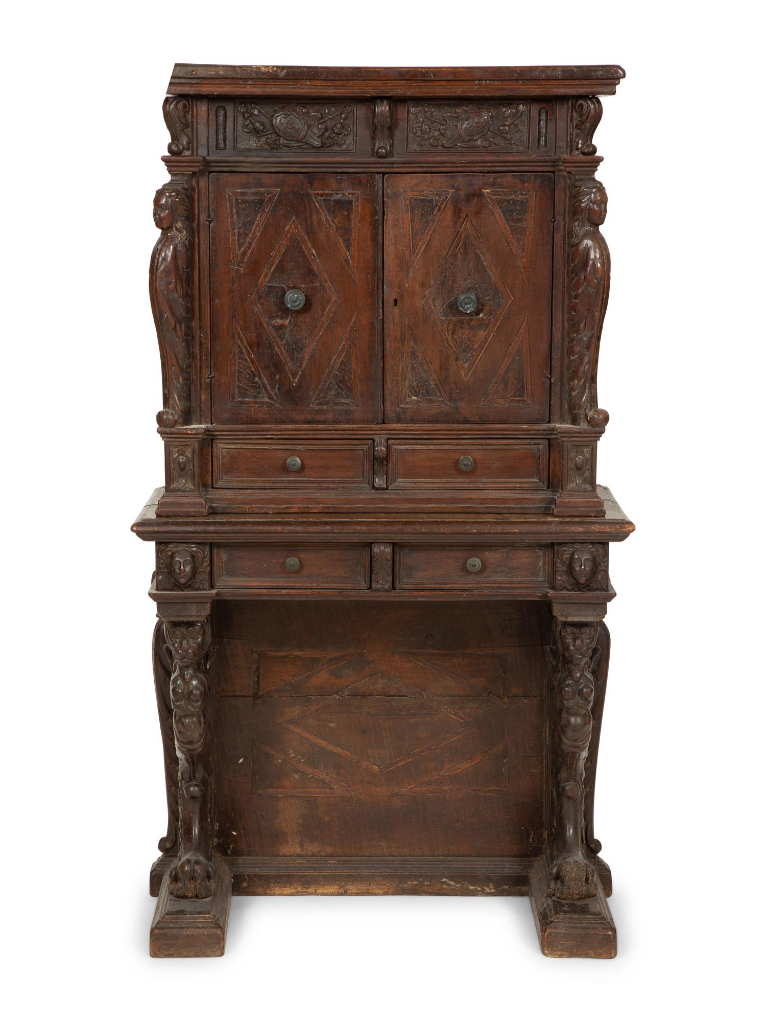 An Italian Carved Walnut Cabinet on Stand