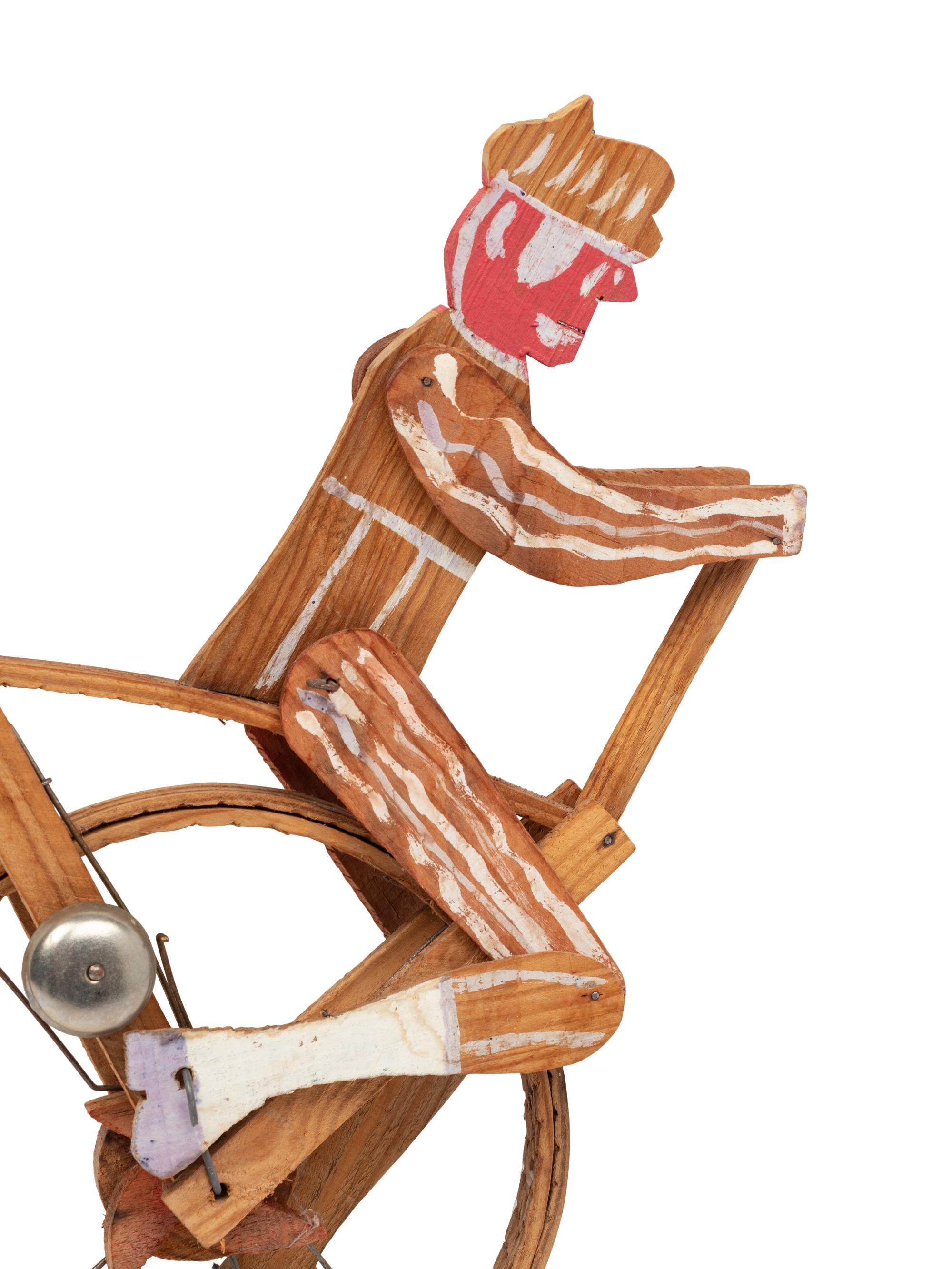 A Child’s Carved and Painted Wood Unicycle Push Toy