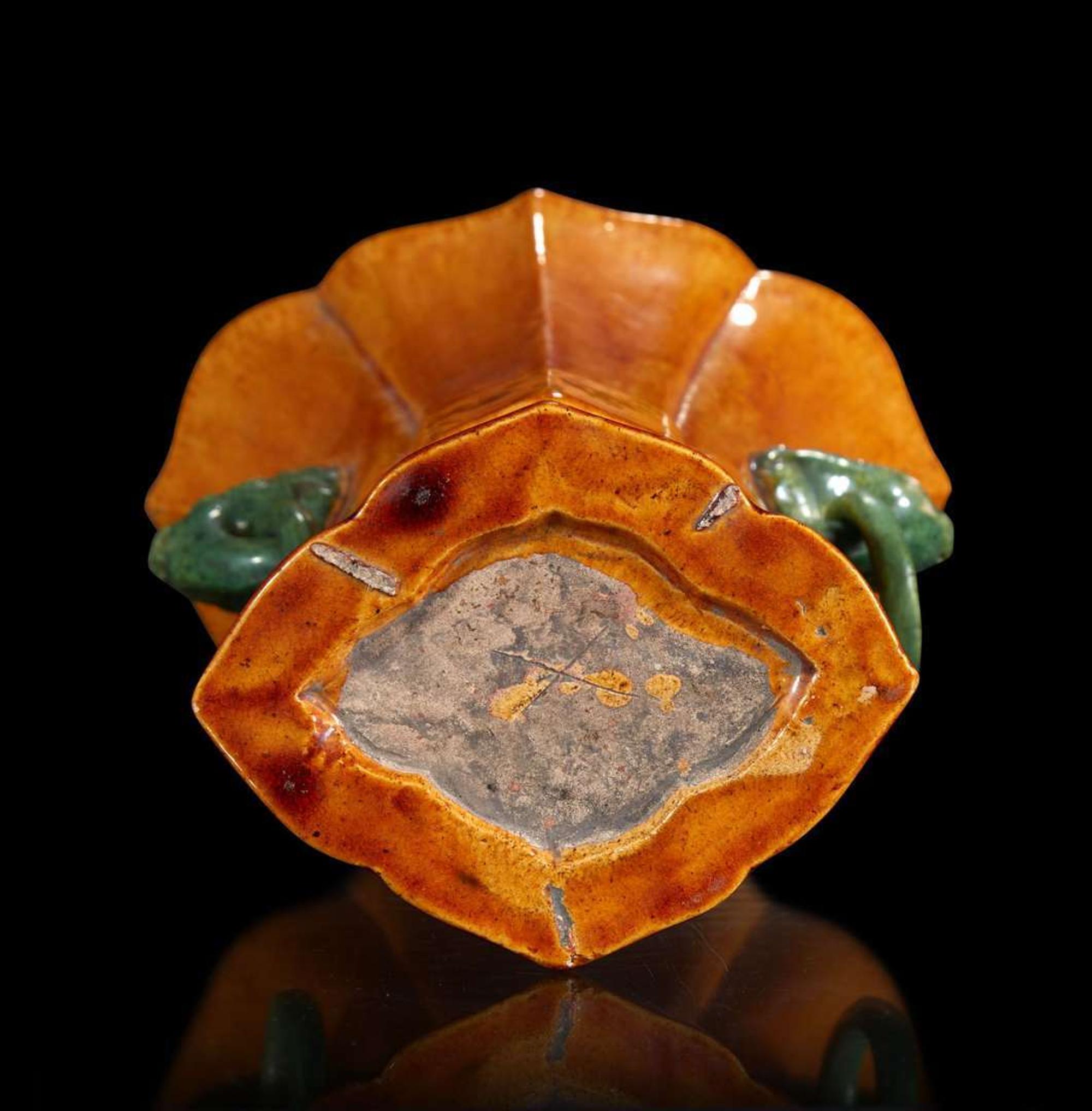 A pair of Chinese yellow-glazed bottle vases and a yellow-glazed gu-form vase 黄釉瓷瓶及木底座两对和黄釉觚式花瓶一件