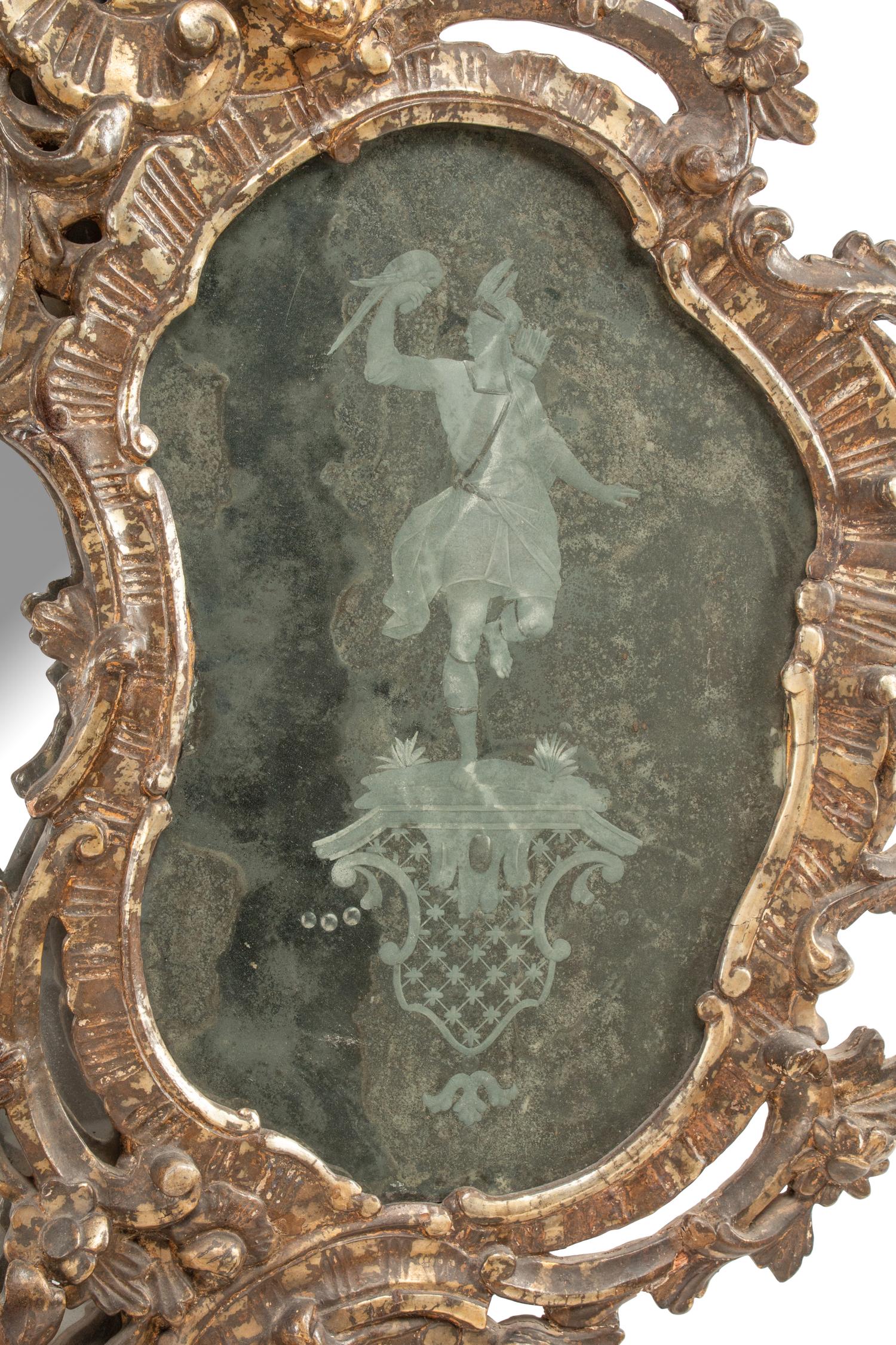 An Italian Silvered Wood and Etched Glass Mirror