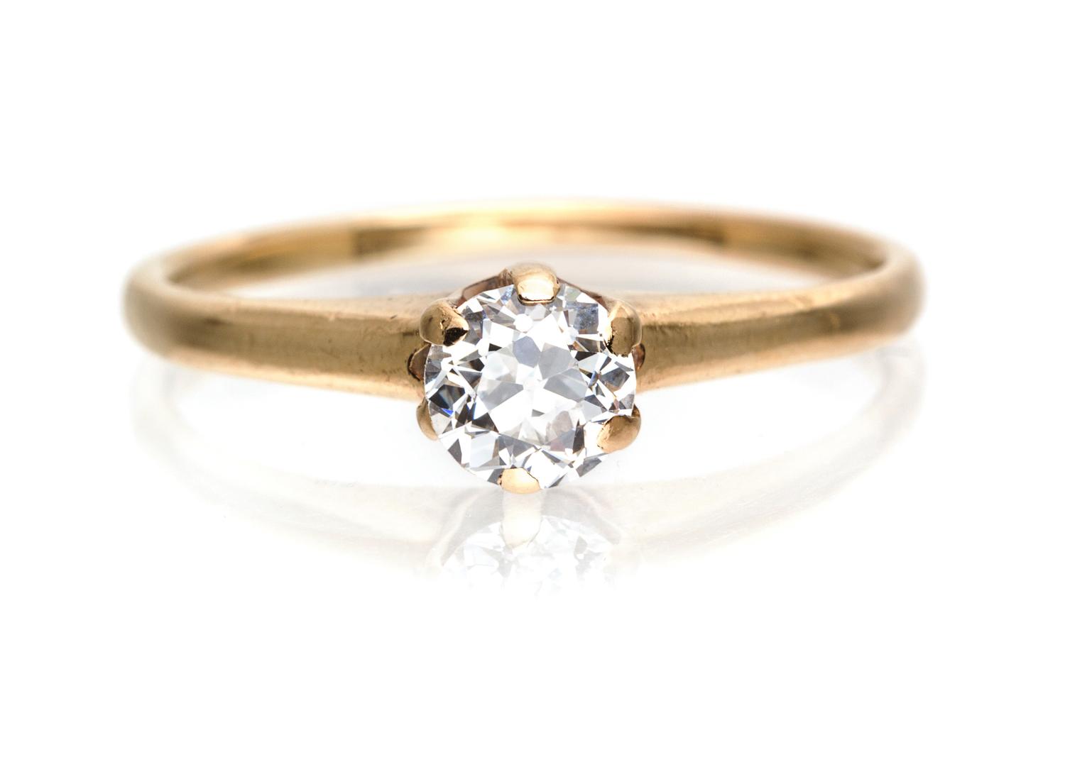 An Antique 14 Karat Yellow Gold and Diamond Solitaire Ring, 1.50 dwts.
