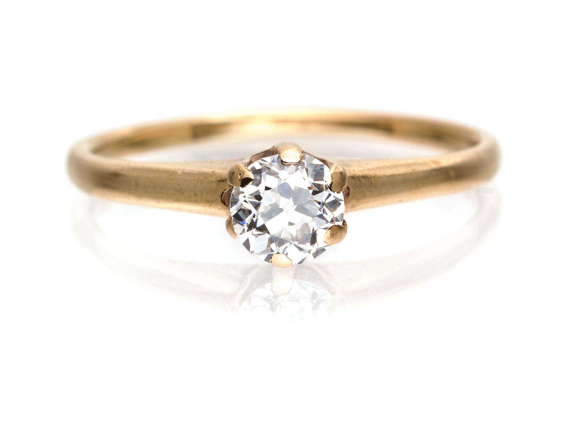 An Antique 14 Karat Yellow Gold and Diamond Solitaire Ring, 1.50 dwts.