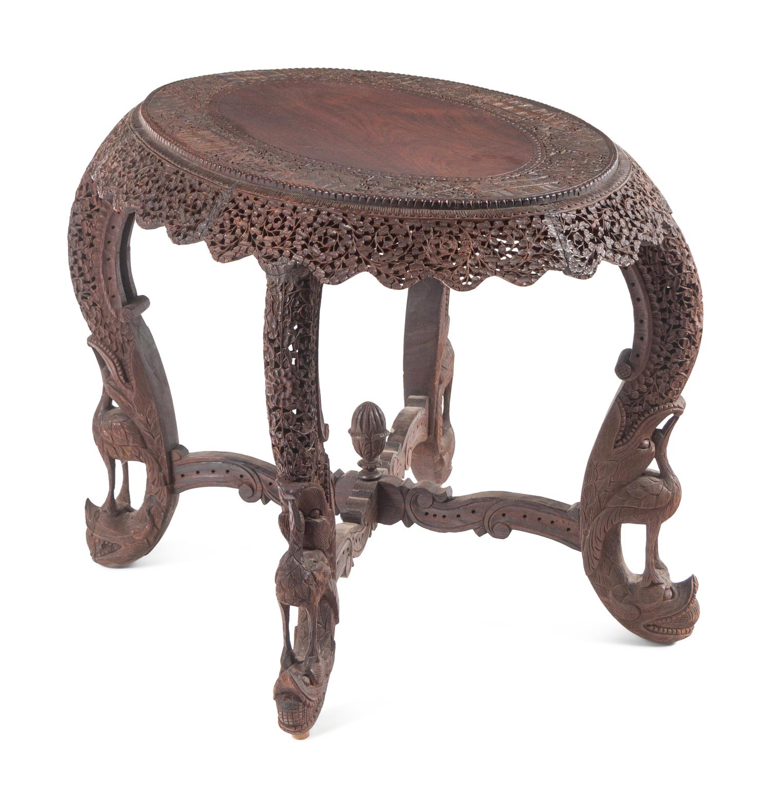 An Anglo-Indian Carved Teakwood Table