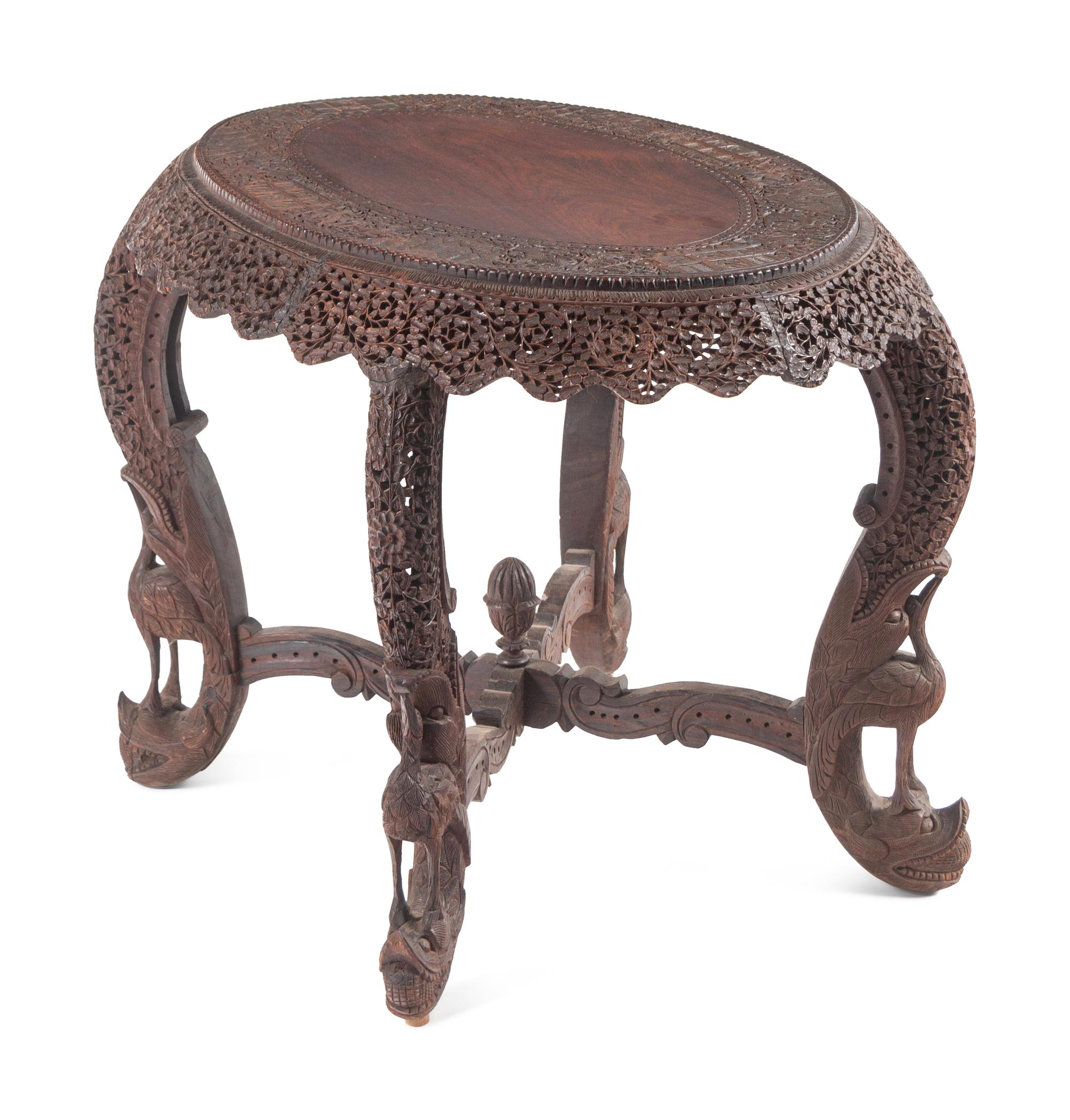 An Anglo-Indian Carved Teakwood Table