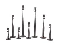 A Set of Eight Wrought Iron Candlesticks