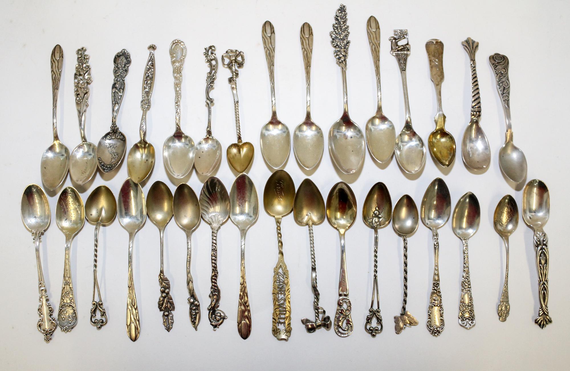 A Collection of American Silver Coffee Spoons, various makers, comprising souvenir spoons and others.