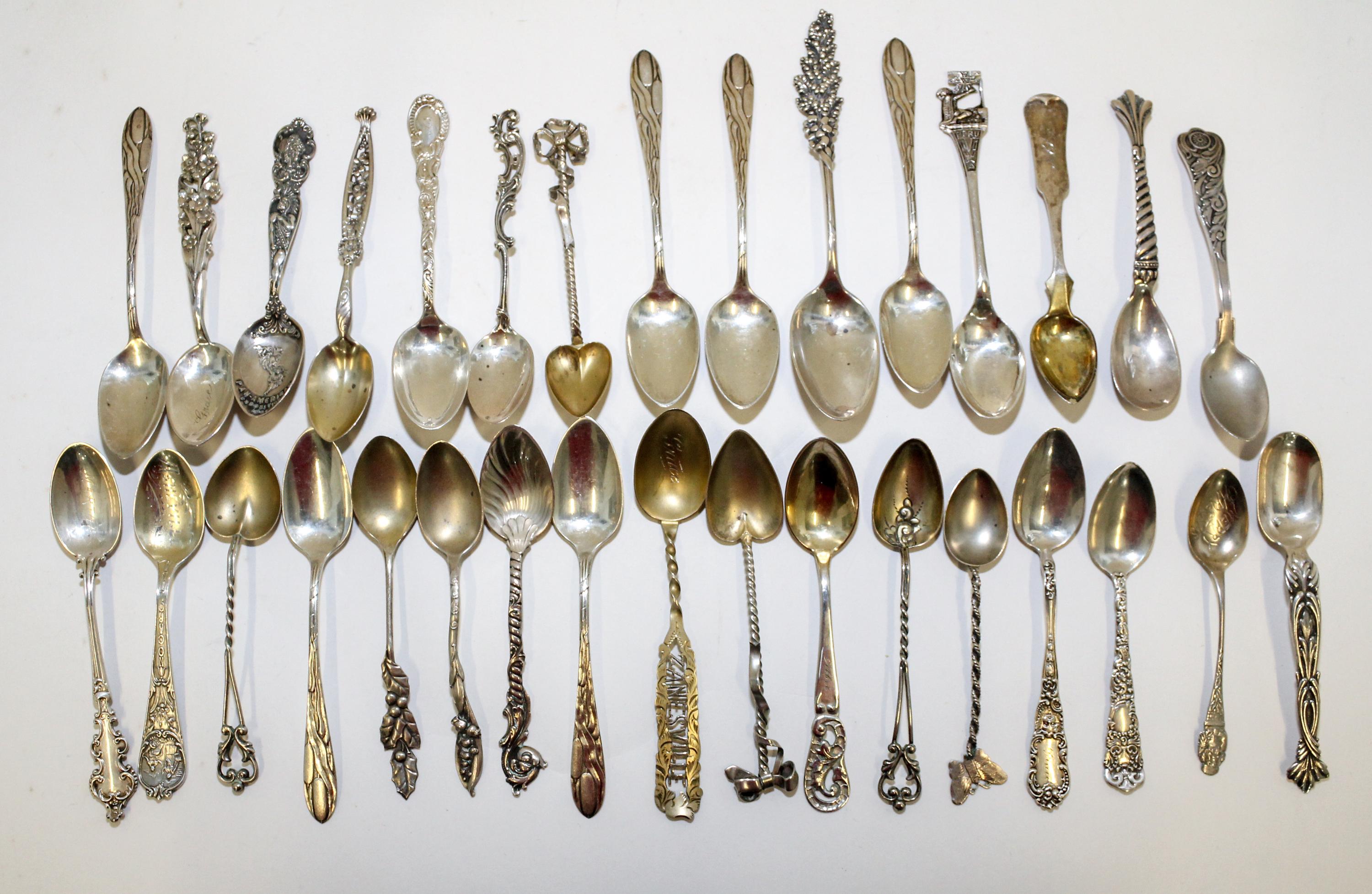 A Collection of American Silver Coffee Spoons, various makers, comprising souvenir spoons and others.