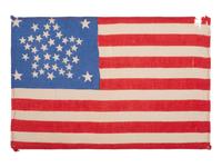 [FLAGS]. 38-star American parade flag with "Great Star" configuration. Ca 1876-1889.