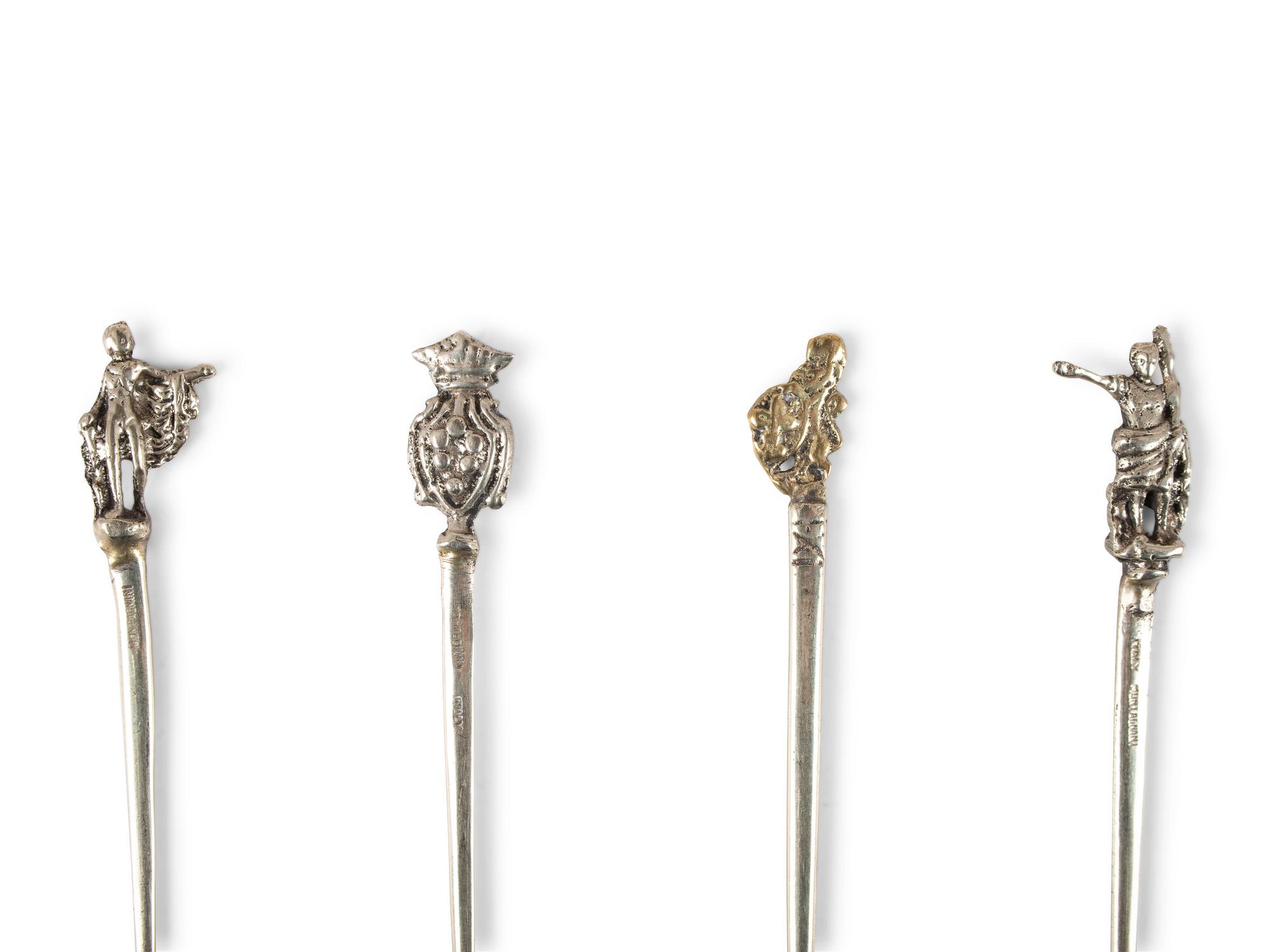 A Group of Coin Silver and Enameled Flatware