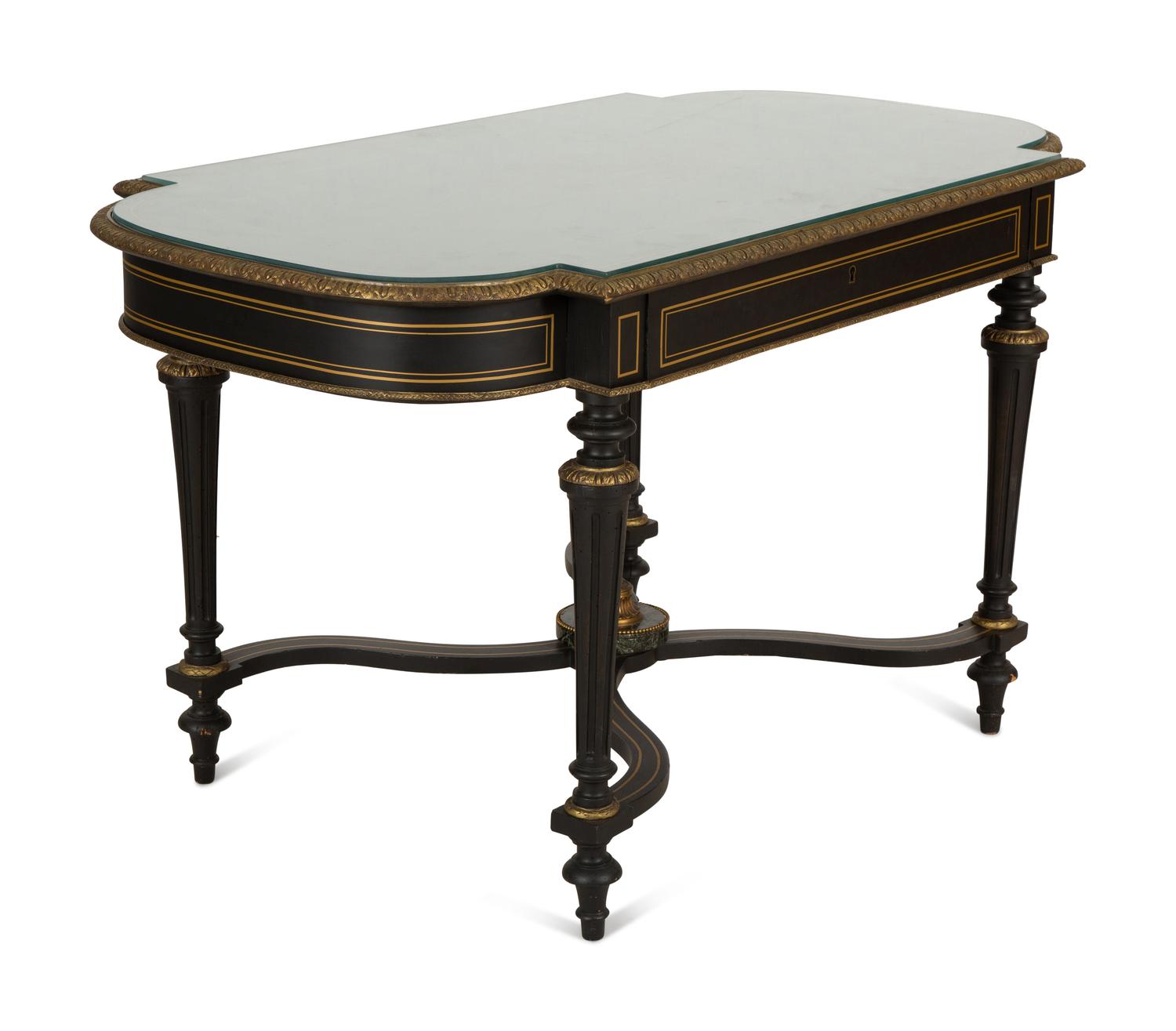 A Napoleon III Style Gilt-Bronze Mounted Ebonized Center Table