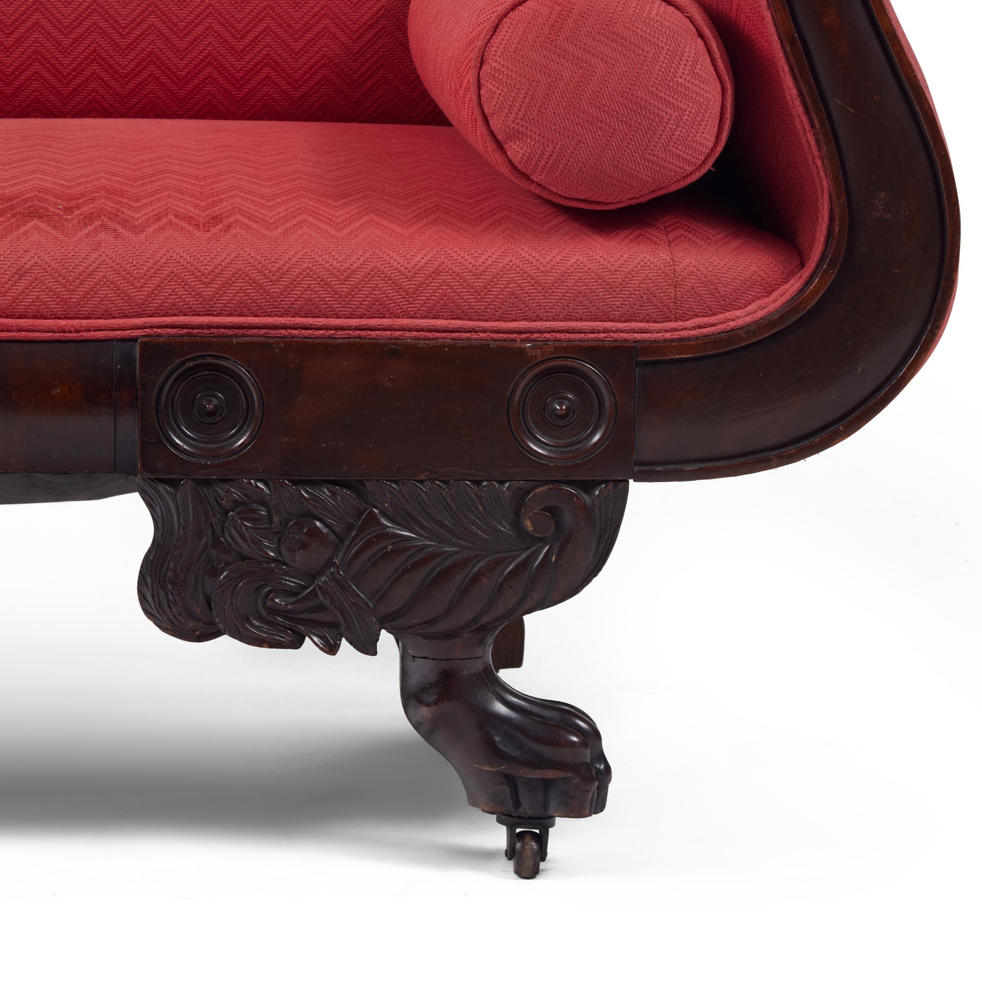A Classical Carved Mahogany Sofa