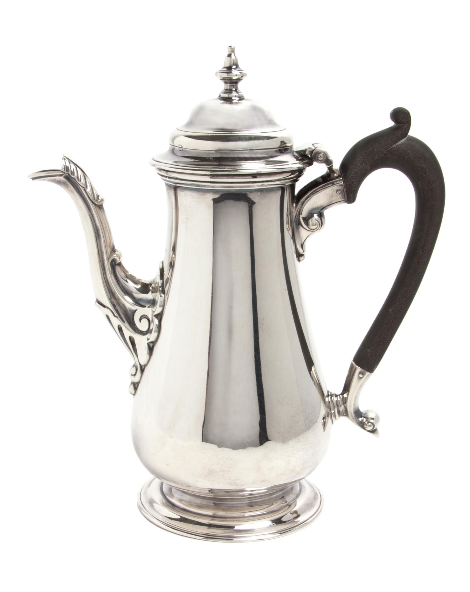 An English Silver Chocolate Pot, George Hape, Sheffield, 1906, of baluster form with a wood handle.