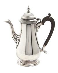 An English Silver Chocolate Pot, George Hape, Sheffield, 1906, of baluster form with a wood handle.