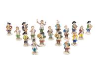 An Assembled Group of Seventeen Sitzendorf Porcelain Monkey Band Figures