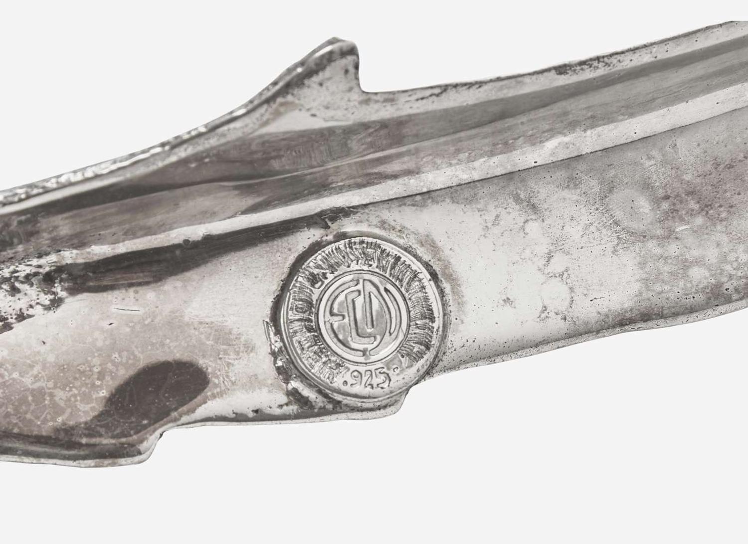 Two sterling silver pheasant-form sculptures, possibly Mexican, probably mid-20th century