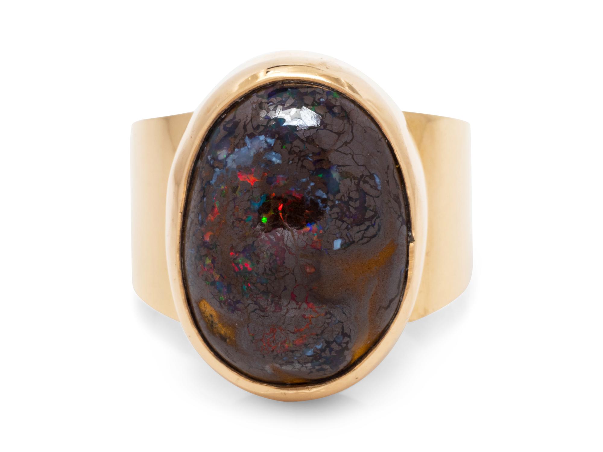 A 14 Karat Yellow Gold and Boulder Opal Ring,
