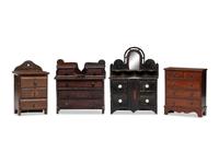 Four Painted or Stained Miniature Chests of Drawers