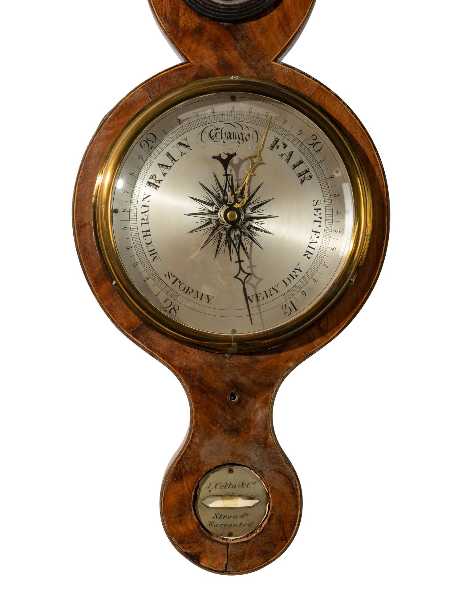 An English Mahogany Wheel Barometer and Thermometer