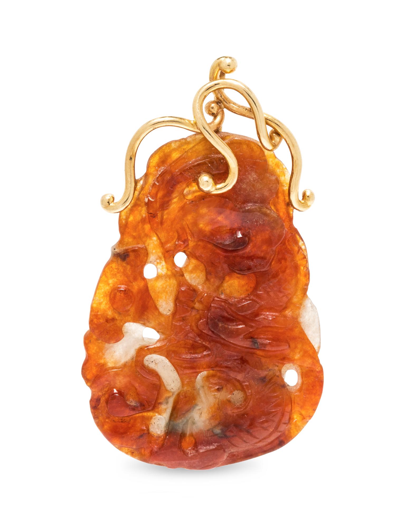 A 14 Karat Yellow Gold and Jadeite Pendant,