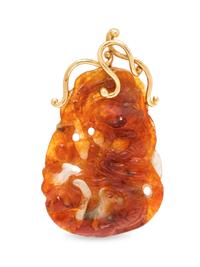 A 14 Karat Yellow Gold and Jadeite Pendant,