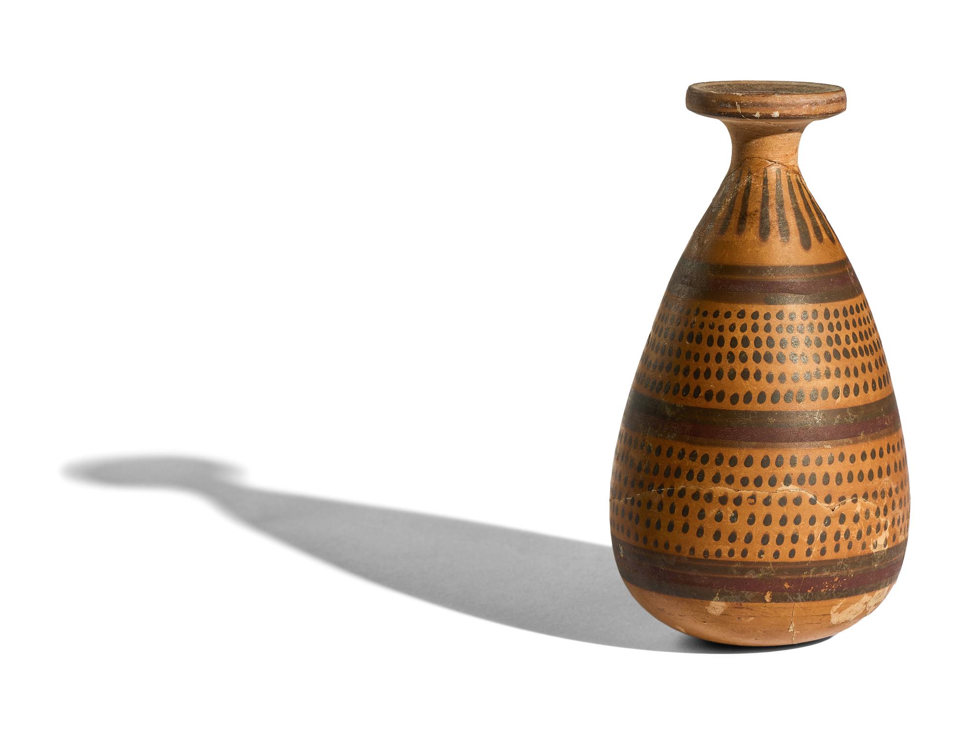 A Greek Potter Alabastron