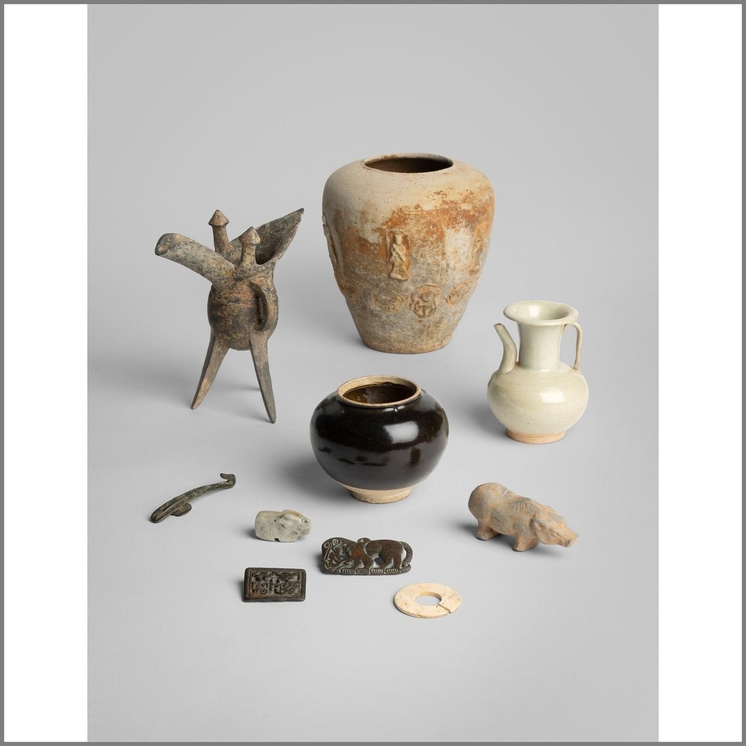 An Archaic Chinese Jade Pendant with Mask, Liangzhu Culture, and a Jade Jue, Western Zhou 良渚文化神人獸面紋玉勒及西周玉玨各一