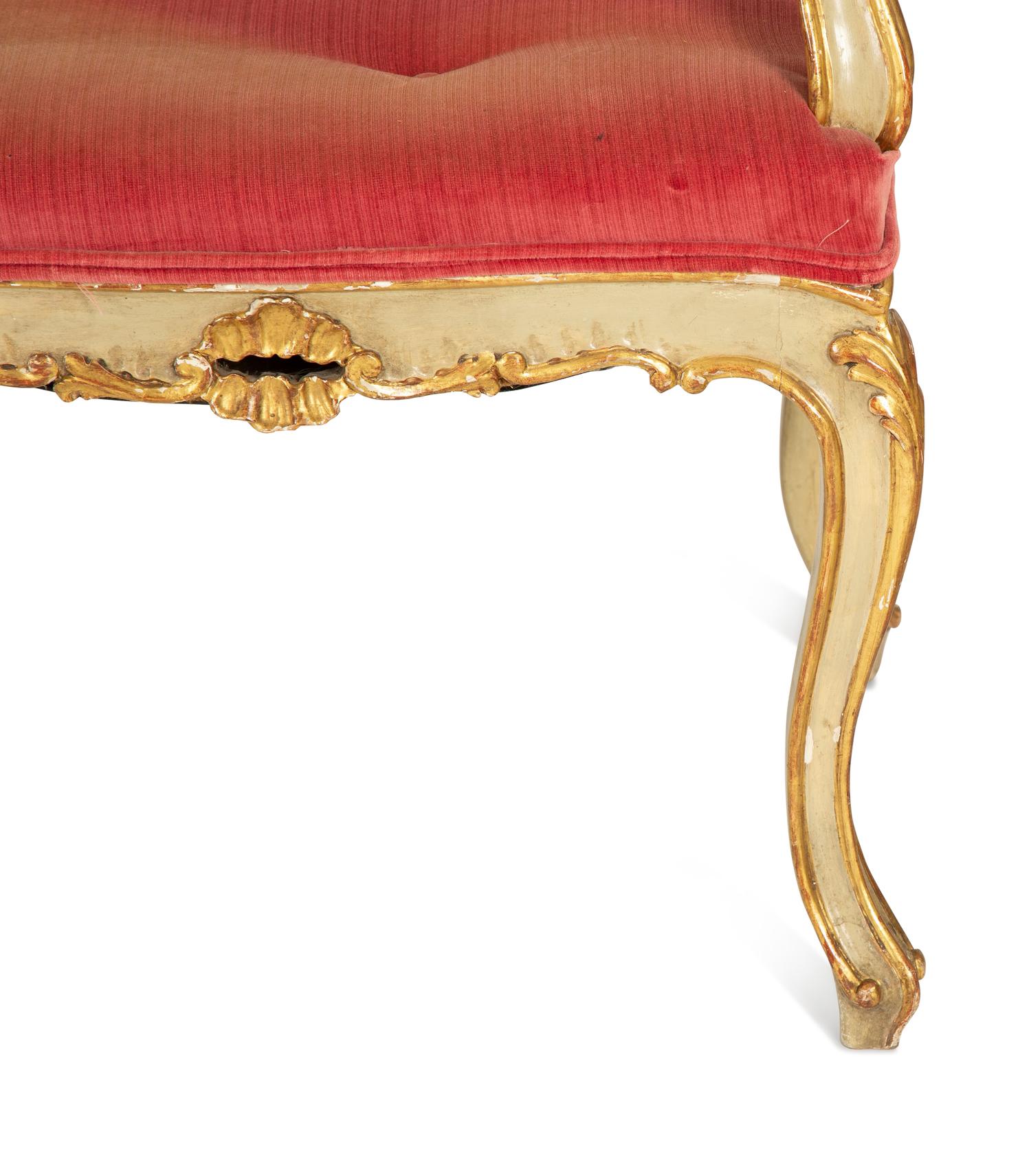 A Louis XV Style Painted and Parcel Gilt Hall Bench