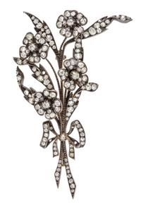 A Victorian Silver Topped Gold and Diamond Flower Brooch, 16.20 dwts.