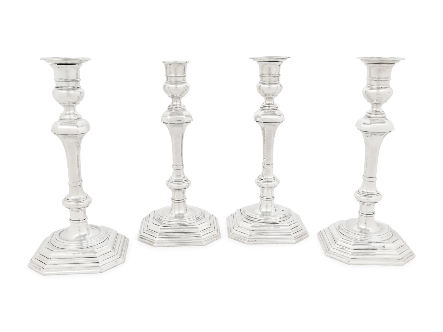 A Set of Four English Silver Candlesticks