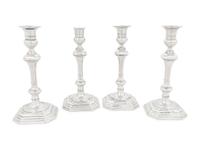 A Set of Four English Silver Candlesticks