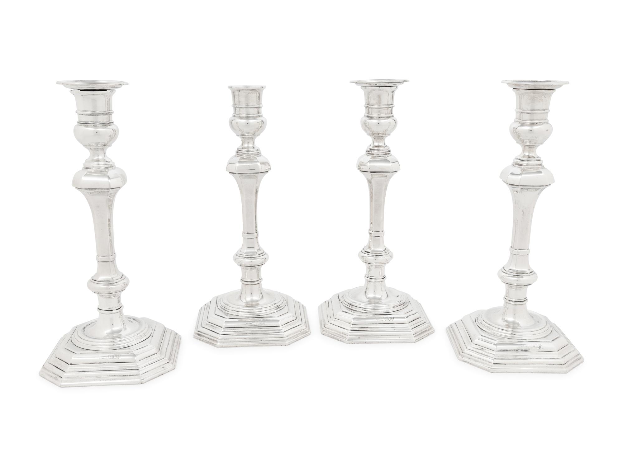 A Set of Four English Silver Candlesticks