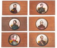 [CIVIL WAR - MAGIC LANTERN SLIDES]. A collection of 148 hand-colored glass slides featuring illustrations of Civil War military and political figures, events, cartoons, genre scenes, and more, including: