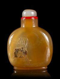 A Caved Silhouette Agate Snuff Bottle