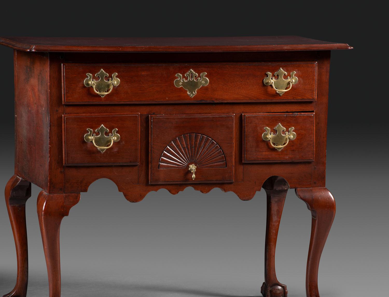 A Chippendale Fan-Carved Walnut Claw-and-Ball Foot Dressing Table