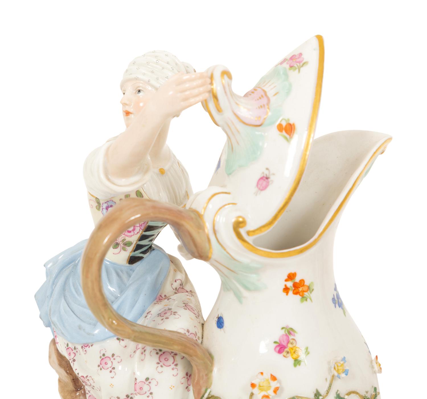 A Pair of Meissen Porcelain Figural Ewers