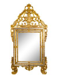 An Italian Baroque Style Giltwood Mirror