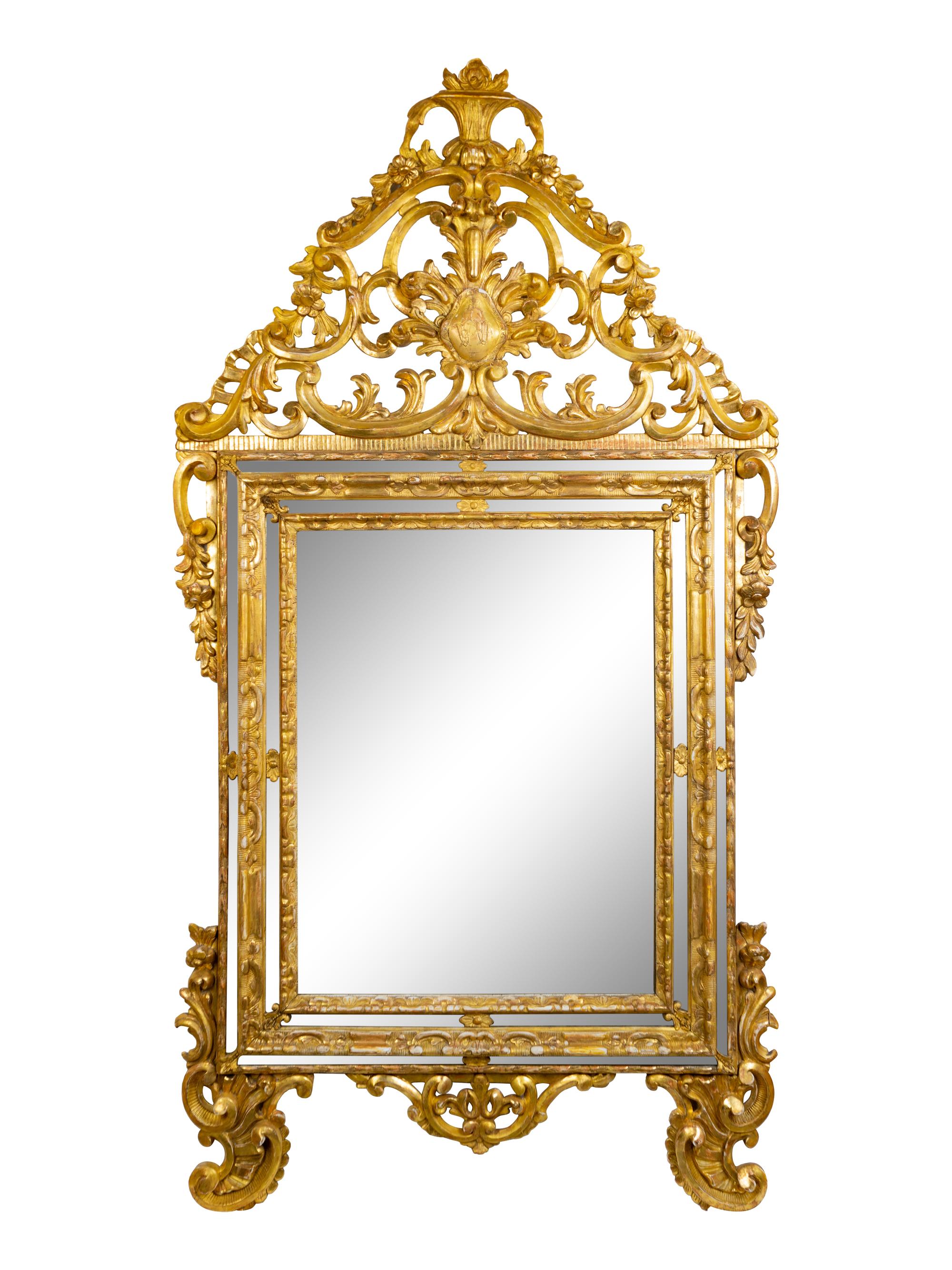 An Italian Baroque Style Giltwood Mirror