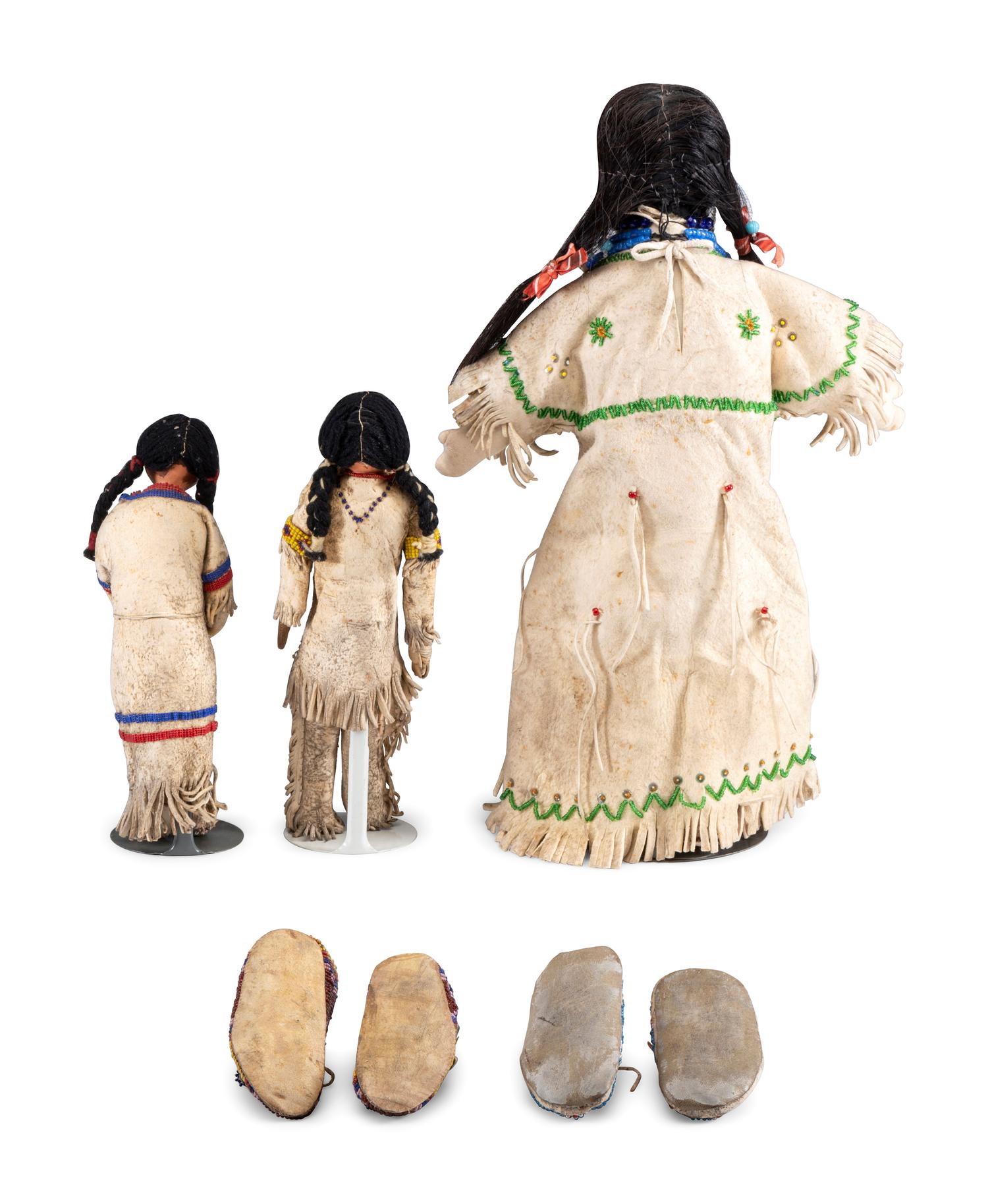 Sioux Infant's Beaded Hided Moccasins, PLUS a Pair of Dolls and One Larger Doll