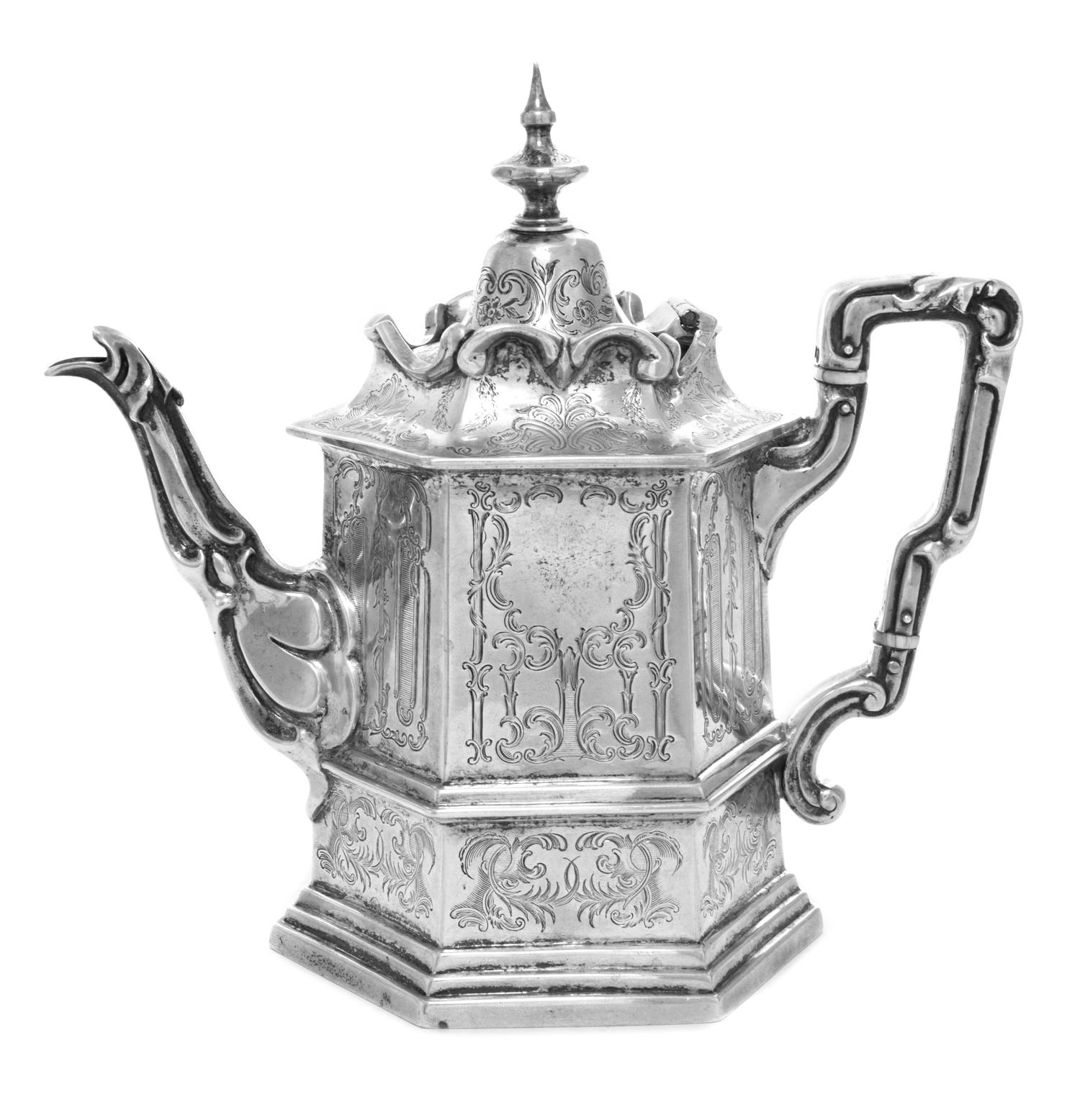 A Victorian Silver Teapot, Joseph Angell & Joseph Angell Jr., London, 1844, of paneled hexagonal form, the hinged and domed cover surmo