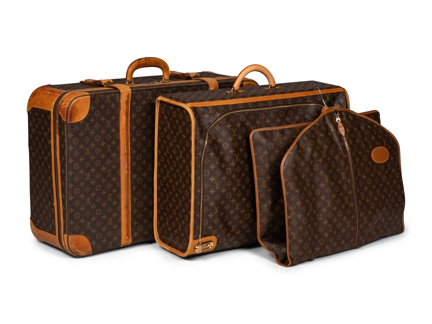 Three Louis Vuitton Luggage Items
