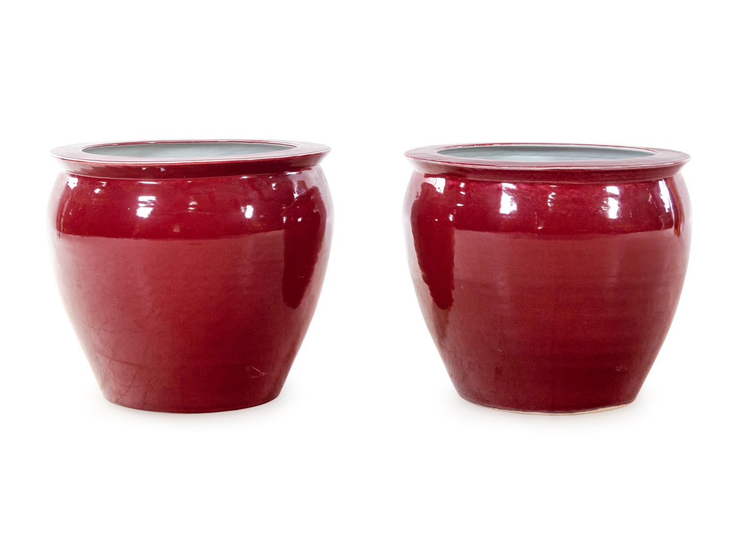 A Pair of Chinese Porcelain Sang de Boeuf Fish Bowls