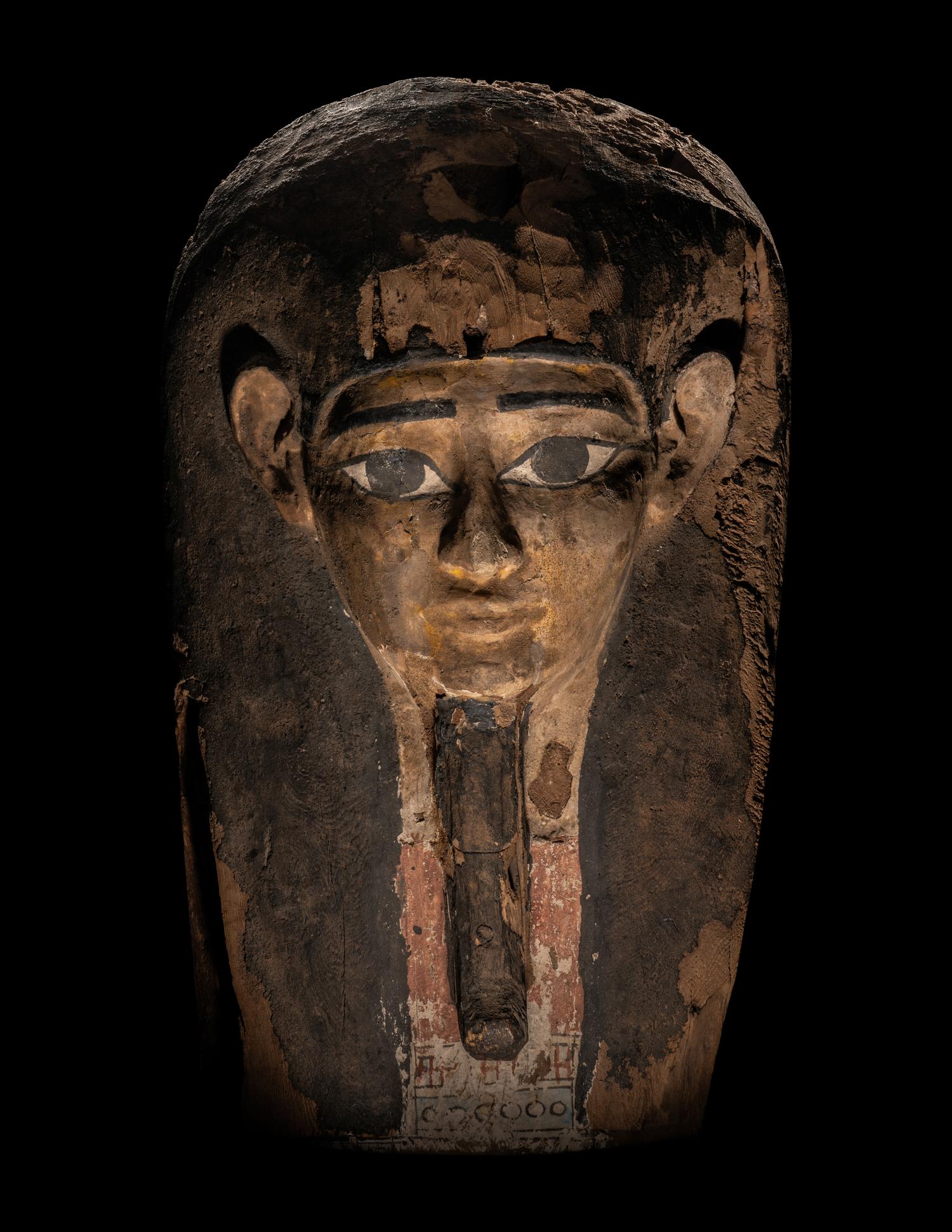 An Egyptian Painted Wood Mummy Mask