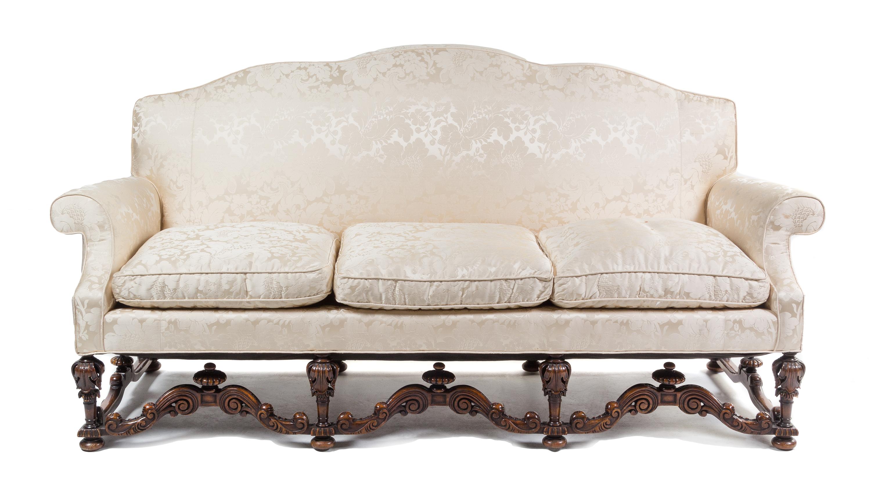 A Baroque Revival Walnut Sofa Width 86 inches. — 19TH/20TH CENTURY