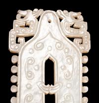 A Celadon Jade Bell-Form Pendant