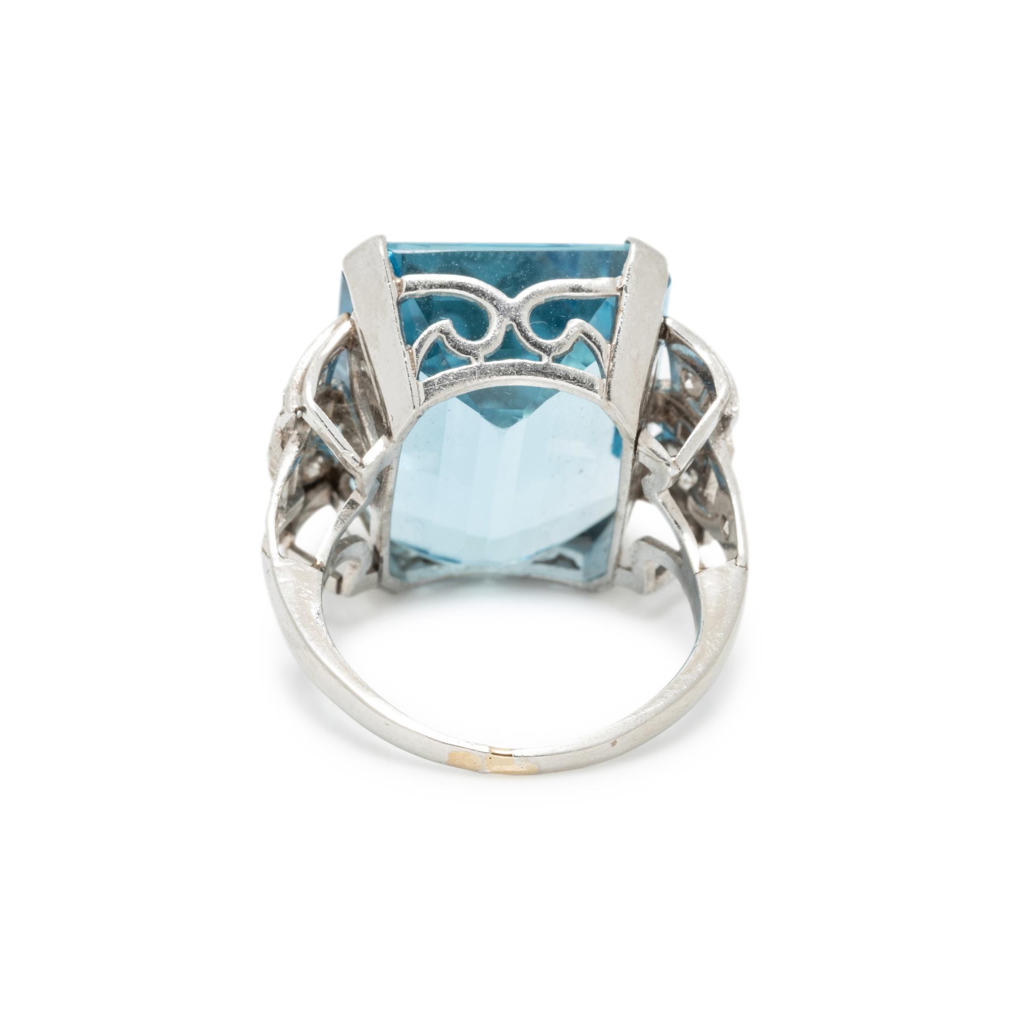 PLATINUM, AQUAMARINE AND DIAMOND RING