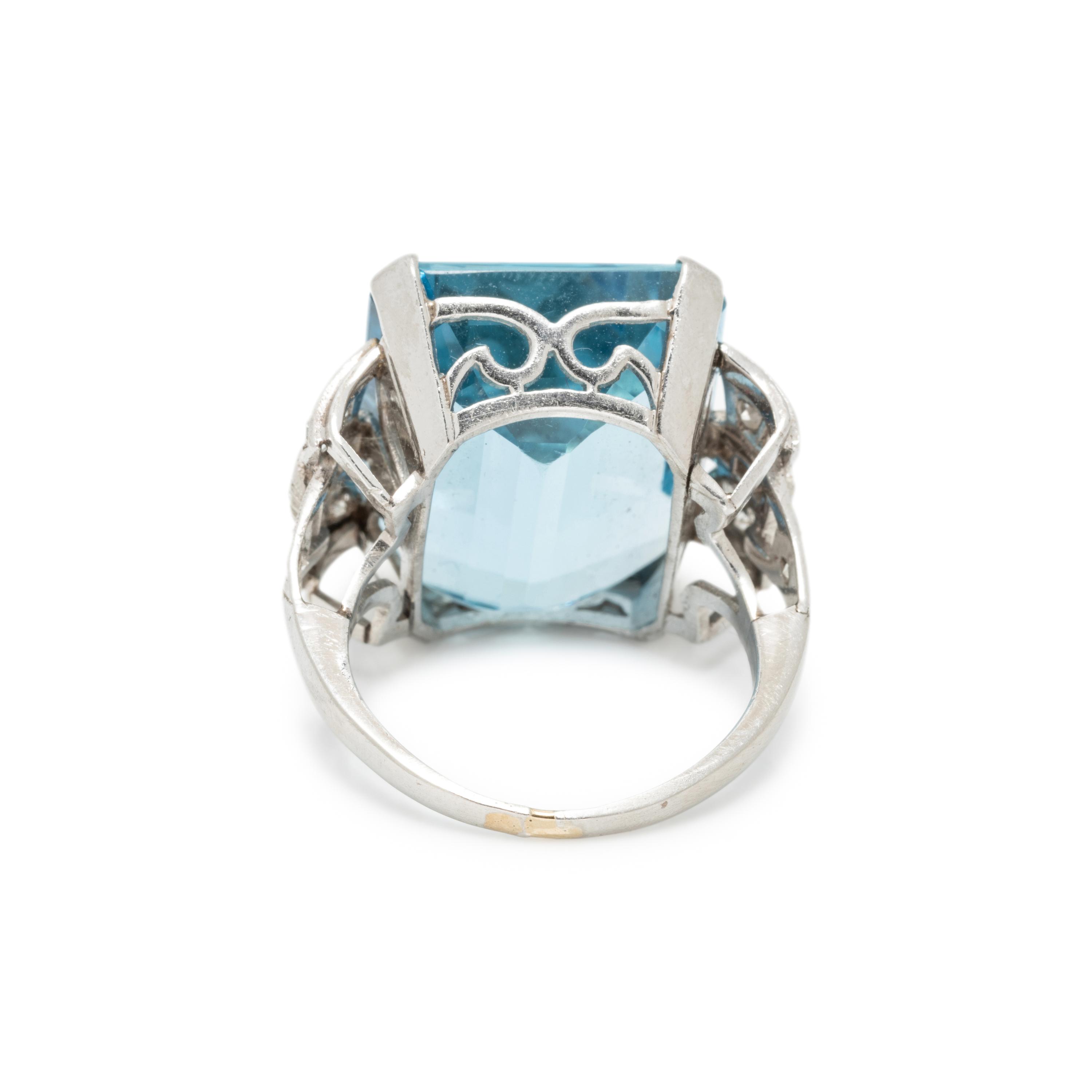 PLATINUM, AQUAMARINE AND DIAMOND RING