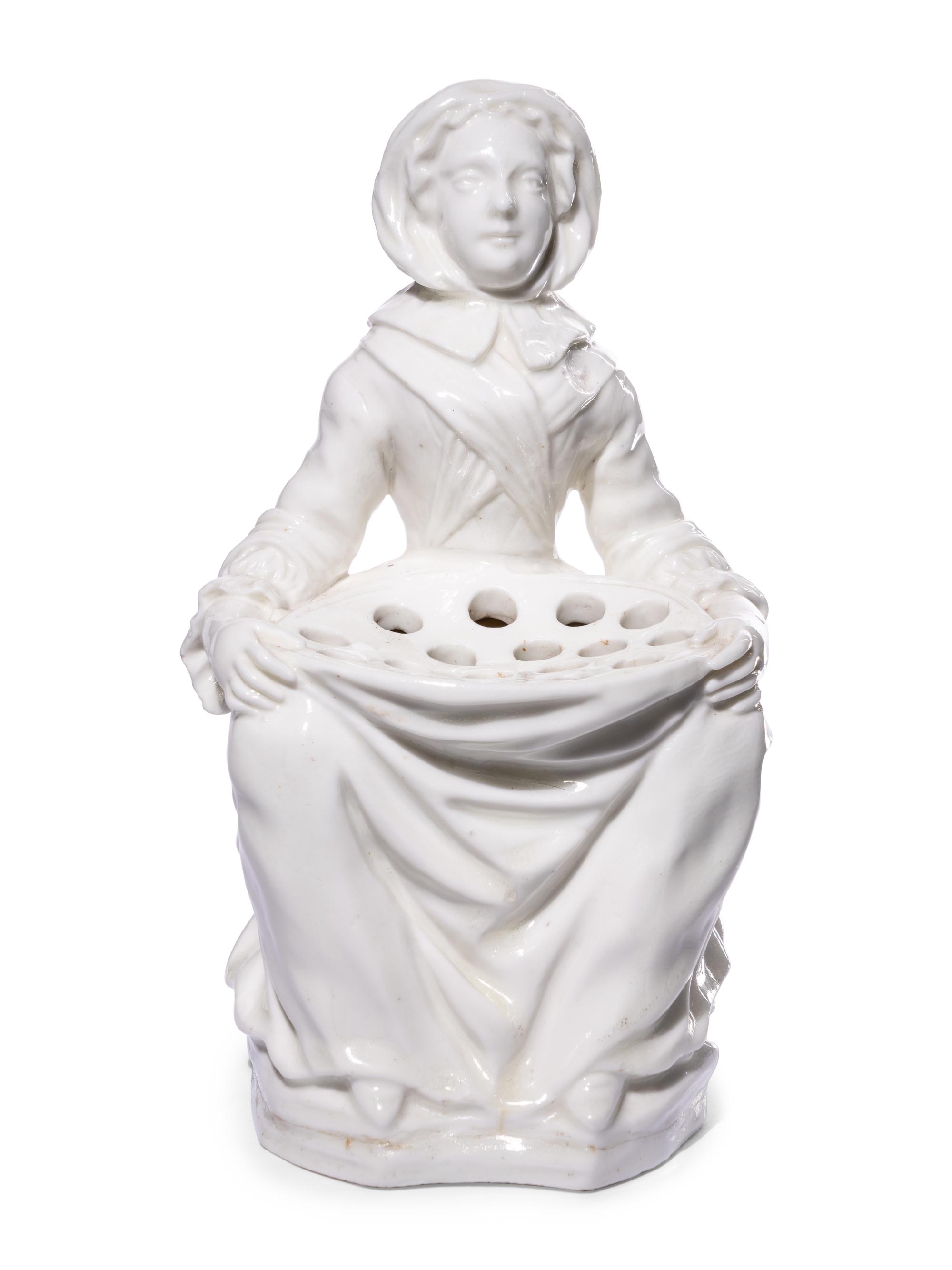 A Pair of French Soft-Paste Porcelain White Bouquetière Figures